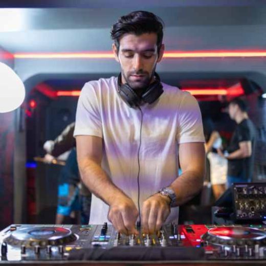 A DJ working at a DJ job.
